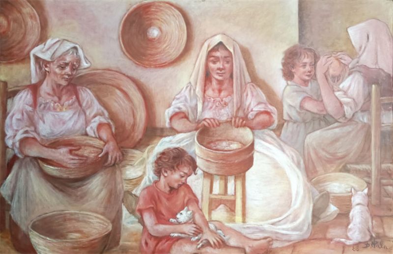 Le donne che lavorano la farina di Pala Dina
